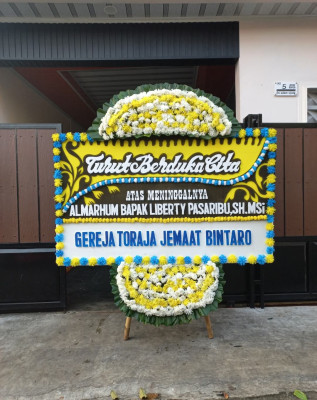 Papan Bunga Duka di Pematang Wangi
